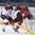 POPRAD, SLOVAKIA - APRIL 14: Latvia's Renars Karkls #3 body checks Switzerland's Tobias Geisser #24 during preliminary round action at the 2017 IIHF Ice Hockey U18 World Championship. (Photo by Andrea Cardin/HHOF-IIHF Images)

